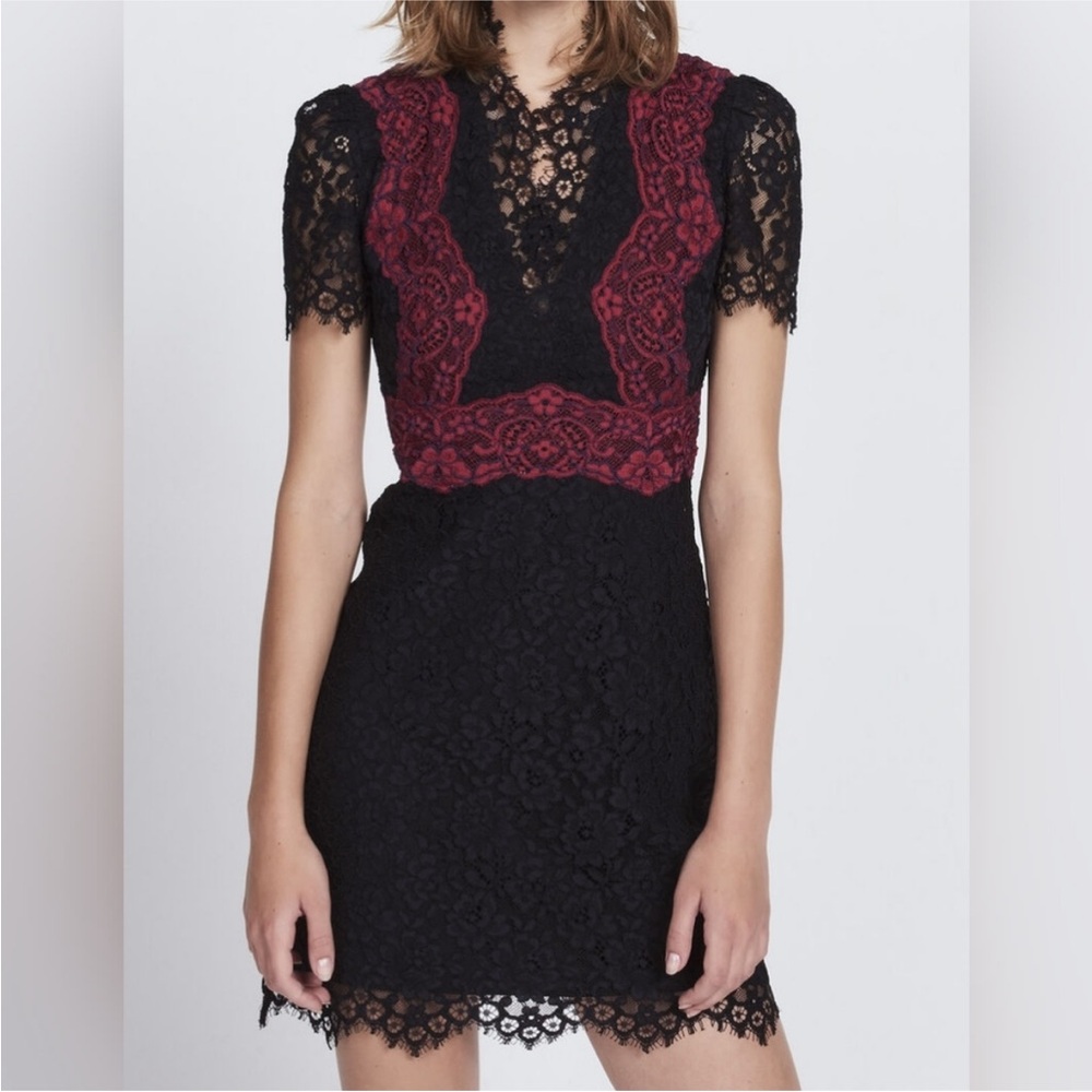 Sandro Black Garment with Lace Accents